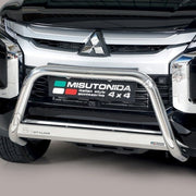 A close-up of a black Mitsubishi vehicle front grille with a polished silver Misutonida bull bar mounted below the grille.